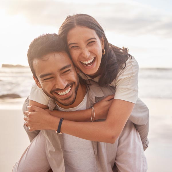 Shot of a couple enjoying a day at the beach